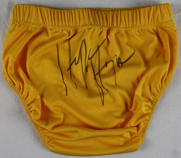 Hulk Hogan Signed Yellow Vintage Style Wrestling Trunks w/Signing Photo (ASI)