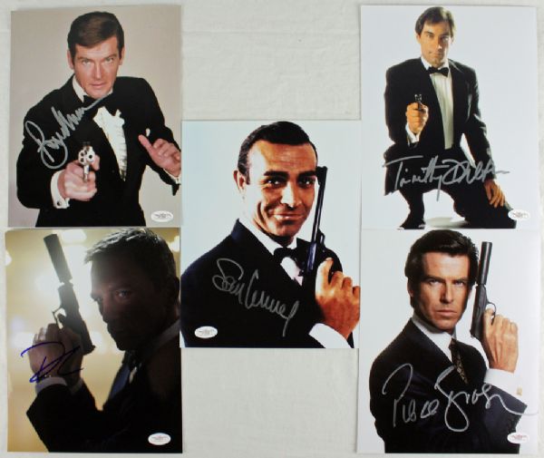 James Bond 007 Signed 8"x 10" Photo Lot (5): Brosnan, Connery, Craig, Dalton & Moore (JSA)