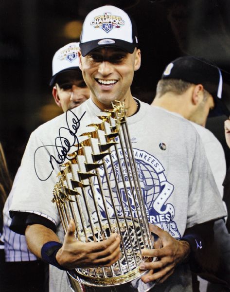 Derek Jeter Signed 11" x 14" Color Photo w/World Series Trophy