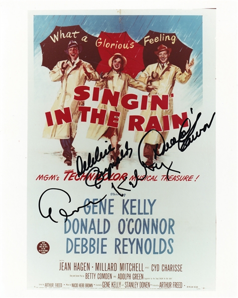 Singin In The Rain Cast Signed 8" x 10" Color Photo with Kelly, Reynolds & OConnor (PSA/JSA Guaranteed)