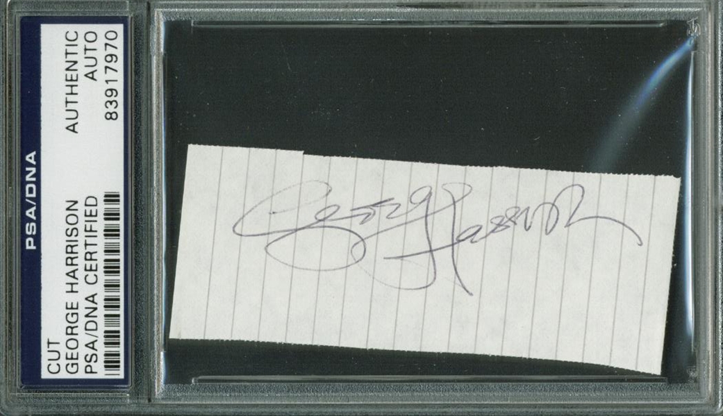 The Beatles: George Harrison Signed 1" x 3" Album Page (PSA/DNA Encapsulated)