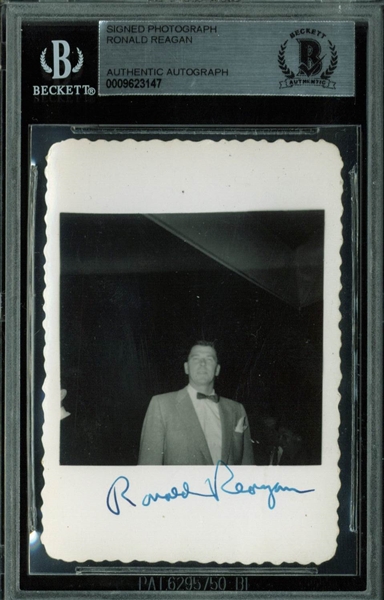 President Ronald Reagan Signed Vintage Candid B&W Photo (BAS/Beckett Encapsulated)