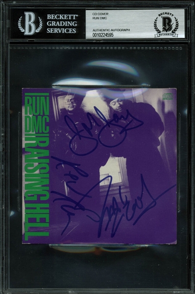 Run DMC Signed "Raising Hell" CD Cover w/ 3 Sigs (BAS/Beckett Encapsulated)