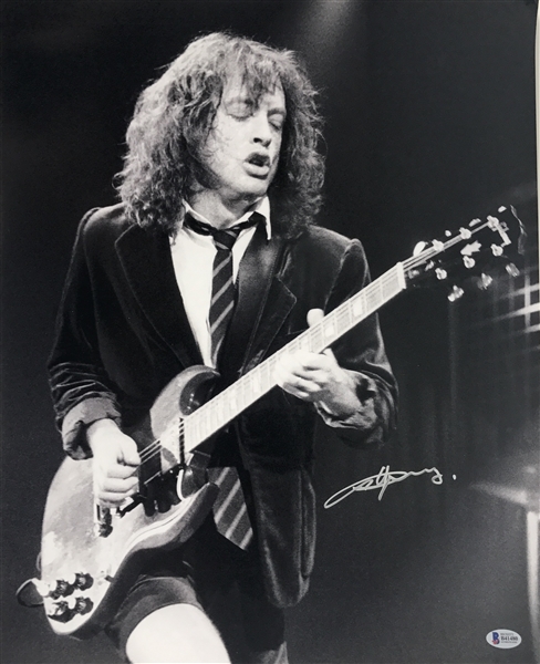 AC/DC: Angus Young Signed 16" x 20" B&W Photograph (Beckett/BAS)