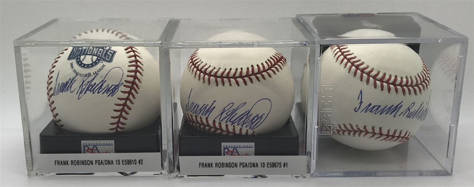 Lot of Three (3) Frank Robinson Signed OML Baseballs (PSA/DNA)