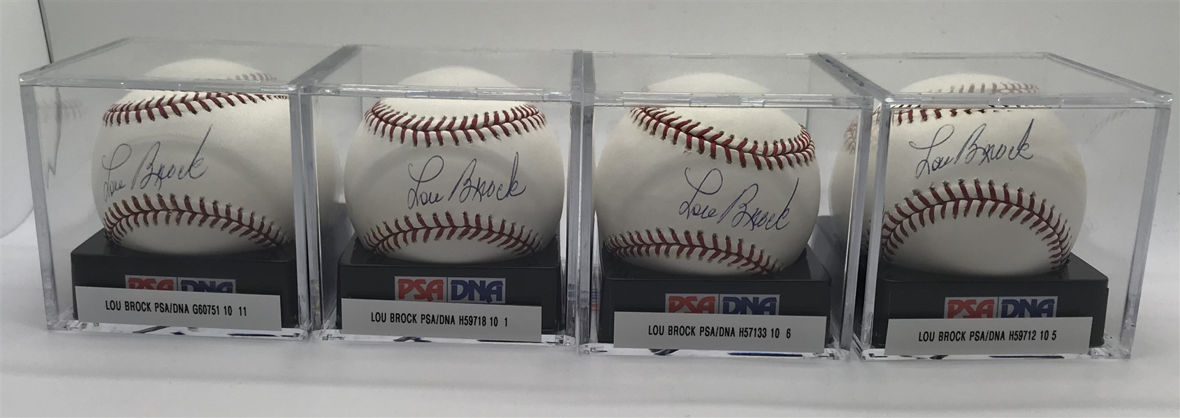 Lot of Eight (8) Lou Brock Signed OML Baseballs PSA/DNA Graded GEM MINT 10!