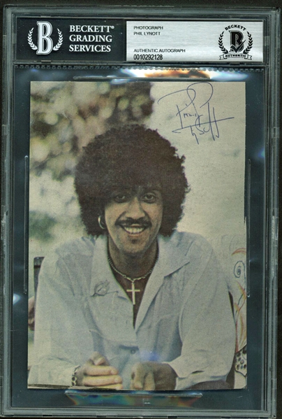 Thin Lizzy: Phil Lynott Signed 5" x 7" Color Magazine Page Photograph (Beckett/BAS Encapsulated)