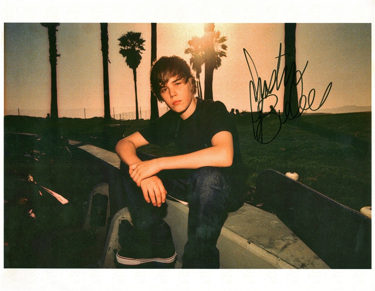 Justin Bieber Signed 8" x 10" Photograph (Beckett/BAS Guaranteed)