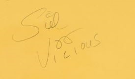 Sex Pistols: Sid Vicious Rare Vintage Signed Autograph Cut (BAS/Beckett Encapsulated)