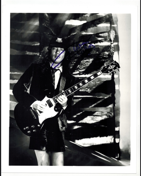 AC/DC: Angus Young 8” x 10" Signed Photo (Beckett/BAS Guaranteed) 