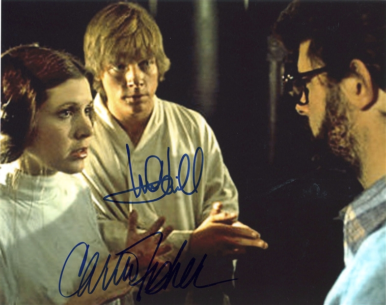 Star Wars: Mark Hamill & Carrie Fisher Dual-Signed Behind-The-Scenes 10” x 8” Photo from “A New Hope” (Beckett/BAS Guaranteed)
