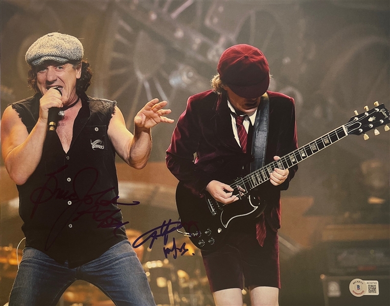 AC/DC Angus Young & Bruce Johnston Signed 11" x 14" Photo (Beckett/BAS LOA)