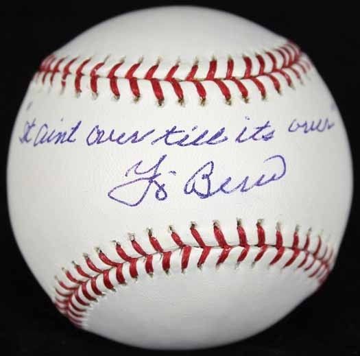 YOGI BERRA AUTOGRAPHED BASEBALL WITH IT AIN'T OVER IN