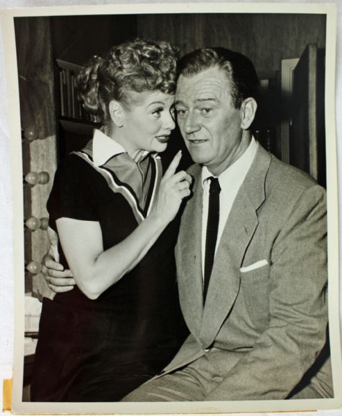 Lot Detail - Original 1955 Press Photo featuring Lucille Ball & John Wayne!