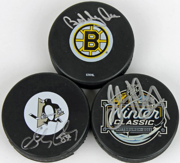 Hockey Stars Signed Puck Lot with Crosby & Orr