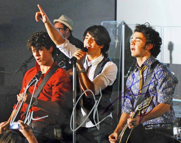 The Jonas Brothers Group Signed 11" x 14" Color Photo