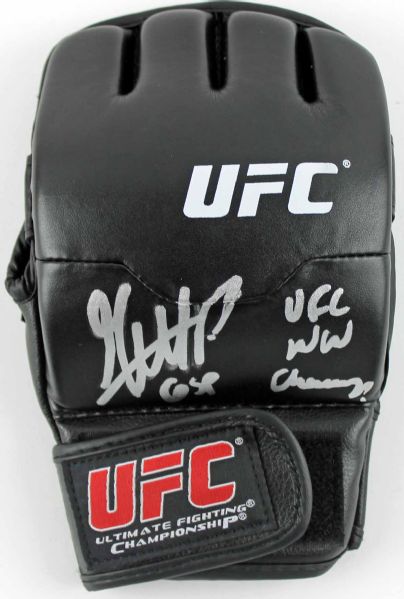 Georges St. Pierre Signed UFC Pro Model Boxing Glove with "GSP - UFC WW Champ" Inscription