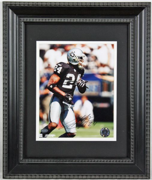 Charles Woodson Signed 8" x 10" Color Photo in Framed Display (Raiders)(Mtd Memories)