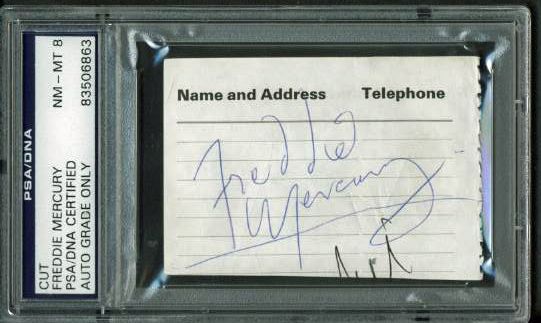 Queen: Freddie Mercury Signed 1.5" x 2.5" Autograph Page (PSA/DNA Encapsulated)