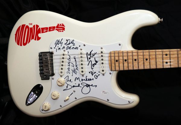 The Monkees Rare Group Signed Fender Squier Stratocaster Guitar (4 Sigs)(JSA)