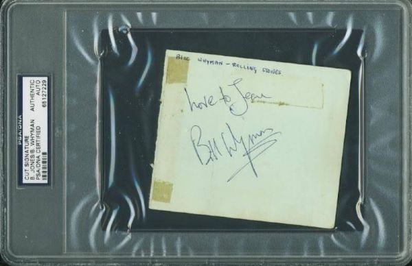 The Rolling Stones: Brian Jones & Bill Wyman Signed Vintage Album Page (PSA/DNA Encapsulated)