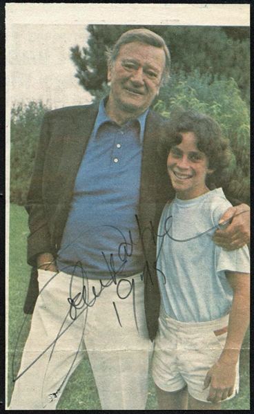 John Wayne Signed Newspaper Photo c. 1975 (PSA/DNA)