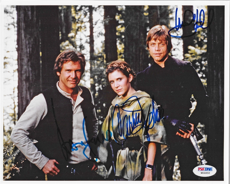 Return of the Jedi Cast Signed 8" x 10" Color Photo with Harrison Ford, Carrie Fisher & Mark Hamill (PSA/DNA)