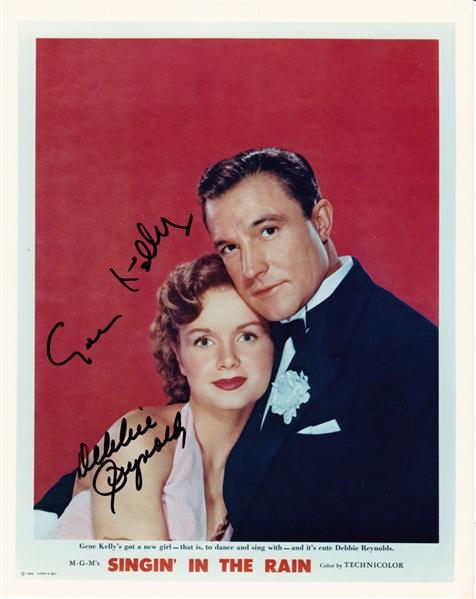 Singin In The Rain: Gene Kelly & Debbie Reynolds In-Person Dual Signed 8" x 10" Color Photo (PSA/JSA Guaranteed)