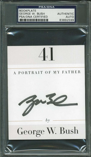 President George W. Bush Signed 2" x 4" Album Page (PSA/DNA Encapsulated)