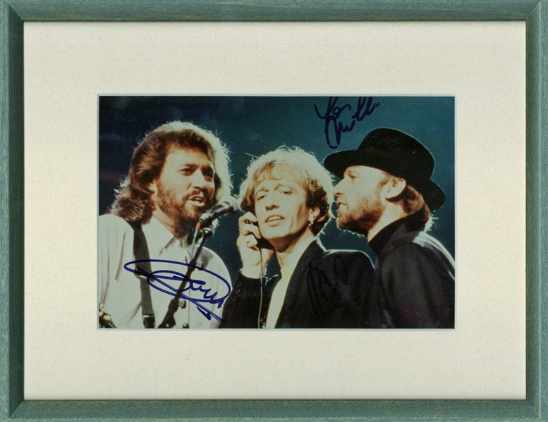 The Bee Gees Group Signed 6" x 8" Framed On-Stage Photograph (PSA/DNA)