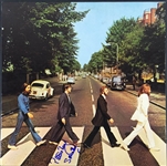 The Beatles: Pattie Boyd Signed Abbey Road Album Cover with Something Inscription (PSA/JSA Guaranteed)