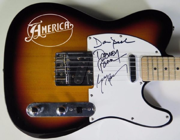 America Signed Guitar By All 3 Members: Dewey Bunnell, Gerry Beckley, and Dan Peek. (PSA/JSA Guaranteed)