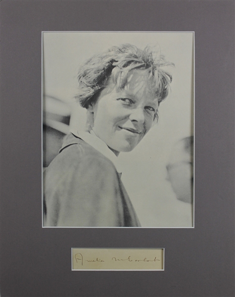 Amelia Earhart Signed Cut in Matted Photo Display (PSA/DNA)