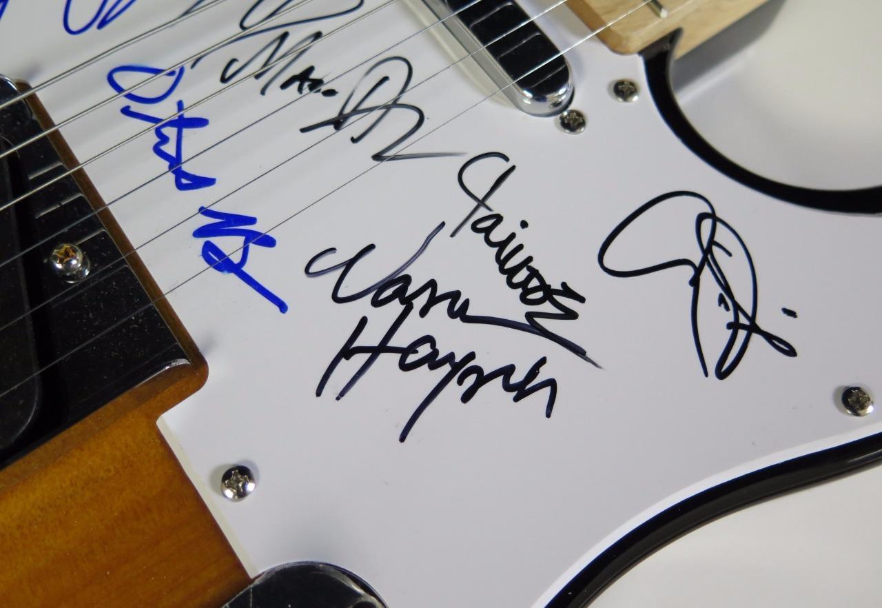 Lot Detail - The Allman Brothers Band Signed Guitar By All 7 Members ...