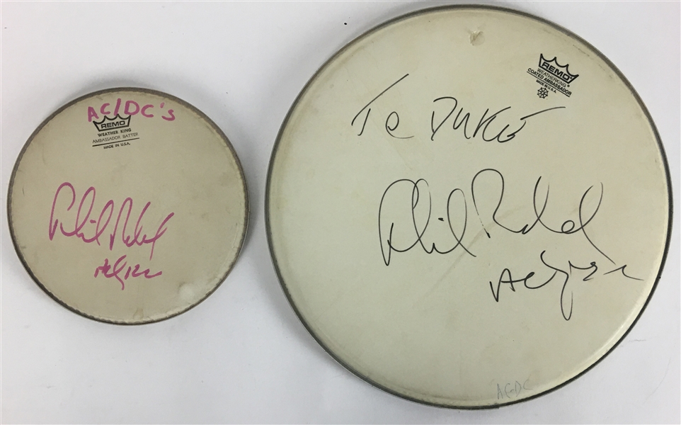 AC/DC Lot of Two (2) Phil Rudd Signed Drumheads (PSA/JSA Guaranteed)