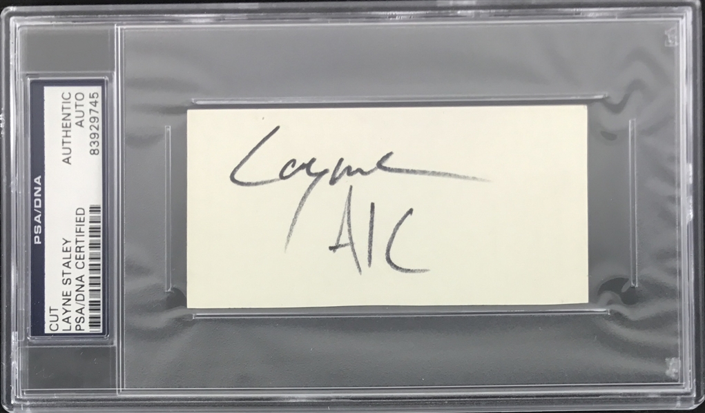 Alice in Chains: Layne Staley Rare Autograph Segment with "AIC" Inscription (PSA/DNA Encapsulated)