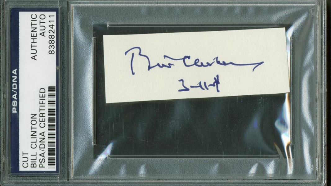 Bill Clinton Near-Mint Signed 1" x 3" Album Page (PSA/DNA Encapsulated)