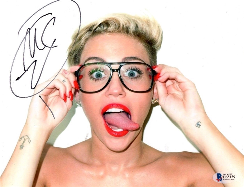 Miley Cyrus Signed 8" x 10" Photo (BAS/Beckett)