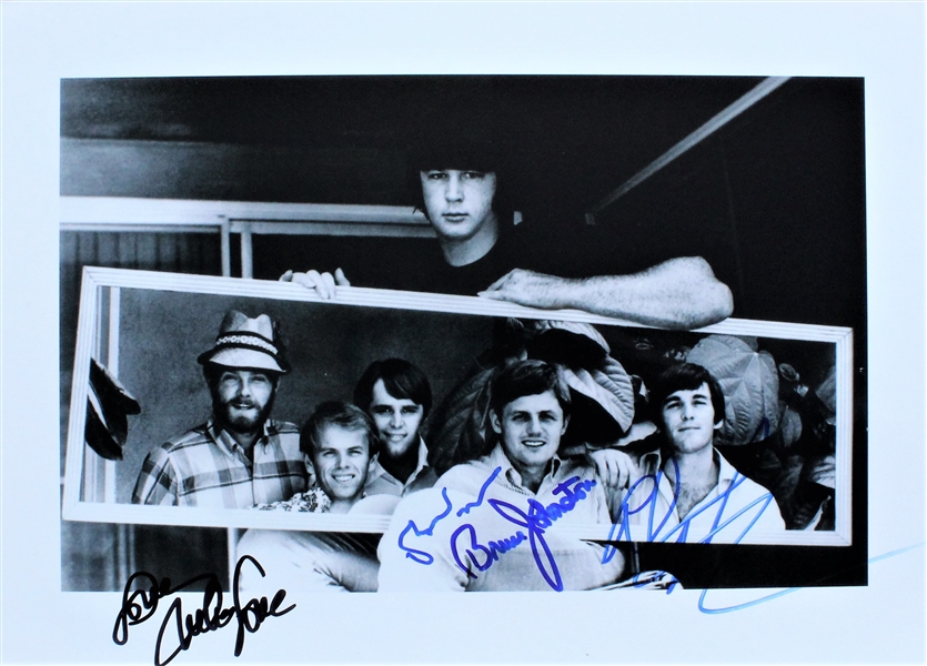 The Beach Boys Group Signed 10" x 14" B&W Photo (4 Sigs)(Beckett/BAS Guaranteed)