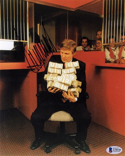 President Donald Trump Signed 8" x 10" Money Photograph (Beckett/BAS)