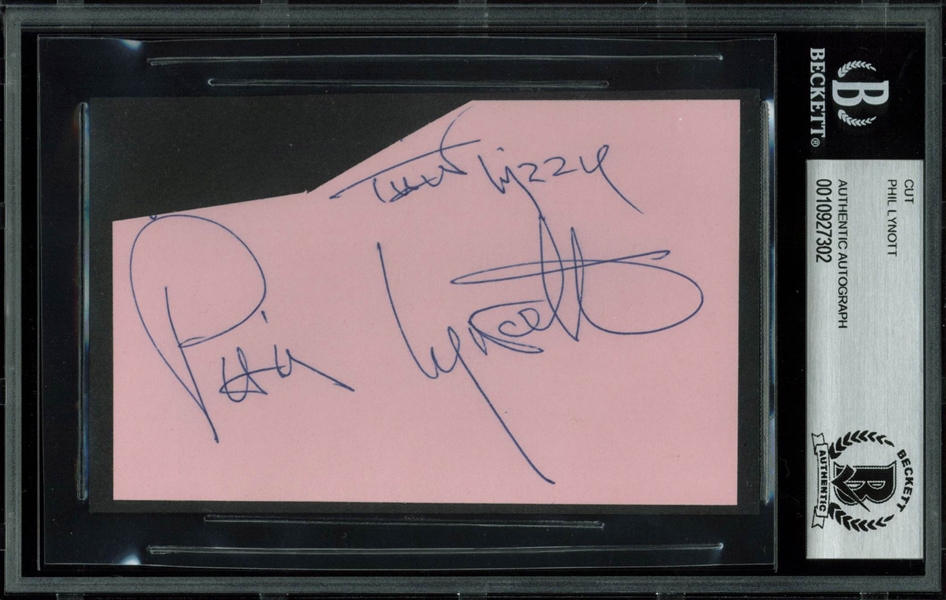 Thin Lizzy: Phil Lynott Signed 3" x 5" Cut (Beckett/BAS Encapsulated)
