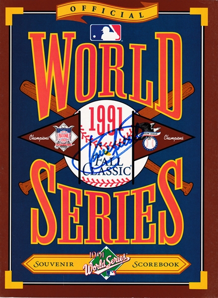 Kirby Puckett Signed 1991 World Series Program (Beckett/BAS Guaranteed)