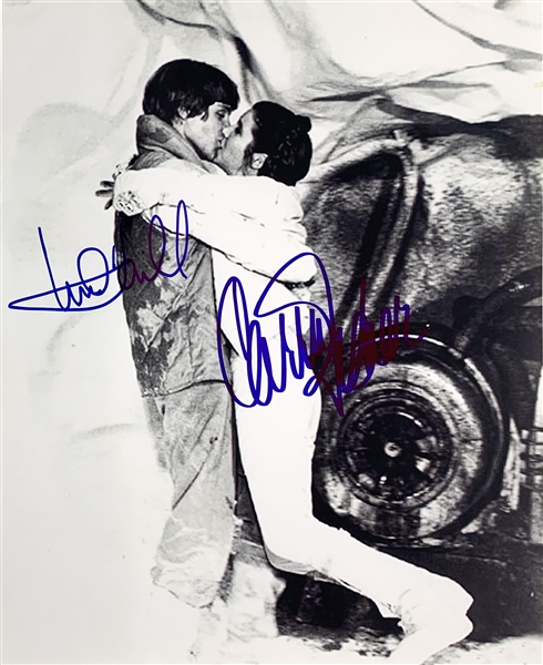 ESB: Mark Hamill & Carrie Fisher Dual Signed 8" x 10" Photo Featuring Notorious Kiss! (Steve Grad Collection)(Beckett/BAS Guaranteed)