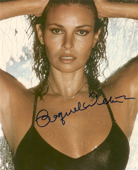 Raquel Welch Signed 8.5" x 11" Photograph (Beckett/BAS Guaranteed)