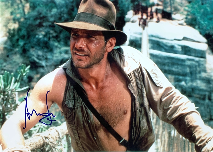 Harrison Ford In-Person Signed 10" x 14" Color Photo as Indiana Jones from "Temple of Doom" (Beckett/BAS Guaranteed)