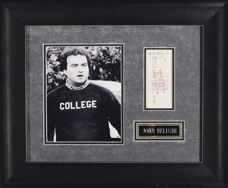 John Belushi Endorsed Signed Bank Check with Unique "2nd City" Inscription - In Custom "Animal House" Themed Display! (Beckett/BAS LOA)