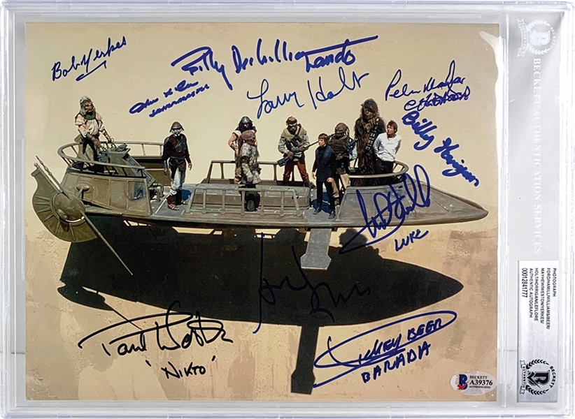 ROTJ: Desert Skiff Cast Signed 8" x 10" Color Photo with Ford, Hamill, Williams, Mayhew, etc. (10 Sigs)(Beckett/BAS Encapsulated)