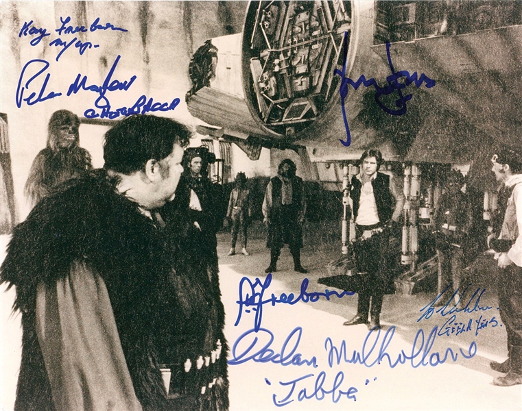 Star Wars: Harrison Ford, Peter Mayhew, and Others Extensively Signed 10” x 8” Millennium Falcon Photo from “A New Hope” (Beckett/BAS Guaranteed)