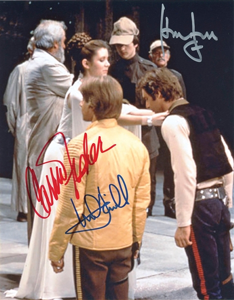 Star Wars: Mark Hamill, Harrison Ford, and Carrie Fisher Multi-Signed 8” x 10” Photo from the Ending Scene of “A New Hope” (Beckett/BAS Guaranteed)