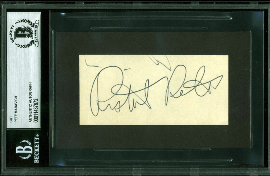 Pistol Pete Maravich Signed 2" x 4" Cut  (Beckett/BAS Encapsulated)